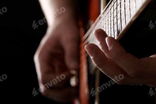 Preview: Musician playing on guitar