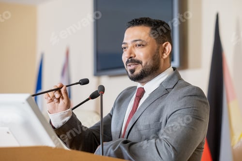 Preview: Confident Middle Eastern Politician Presenting Report