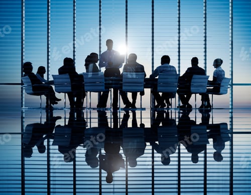 Preview: Business people in a board room meeting