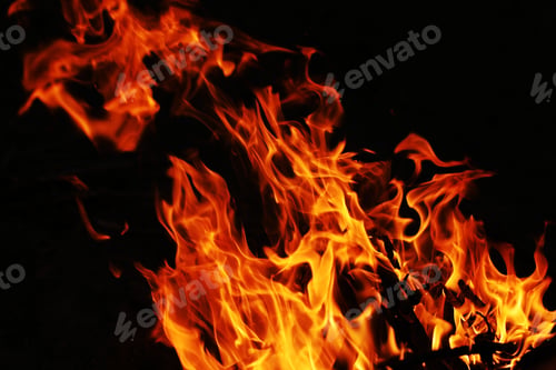 Preview: Fire creates infinity shapes when it burns. The orange from the flame and the black backgroud