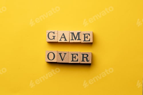 Preview: a yellow warm background without shadows wooden cubes with black letters laid out word game over