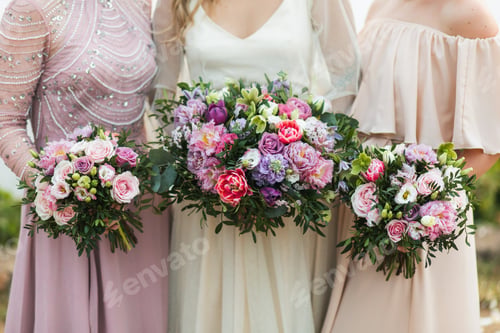 Preview: Three bridesmaids holding in hands beautiful flower bouquets with red, pink, purple peonies