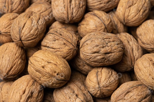 Preview: Close up of a pile of walnuts