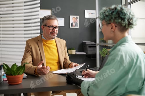 Preview: Woman with disability signing documents