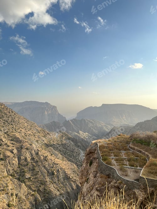 Preview: a view of a winding road through the hills and mountains