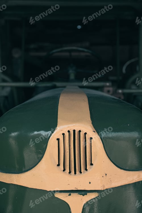 Preview: Closeup shot of the details of the front of an old agricultural tractor