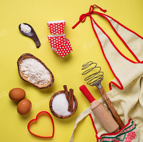 Preview: Ingredients for baking on yellow background