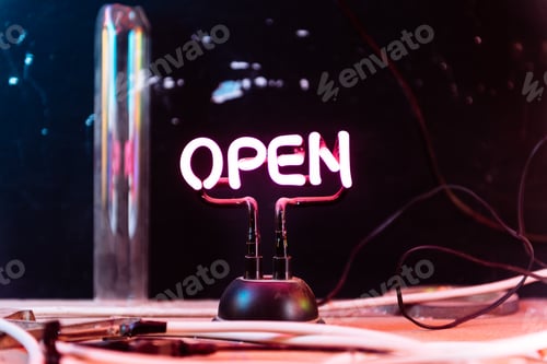 Preview: Pink Neon Open Sign On A Tabletop