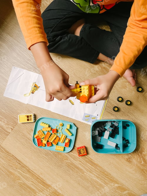 Preview: kid hand play bricks