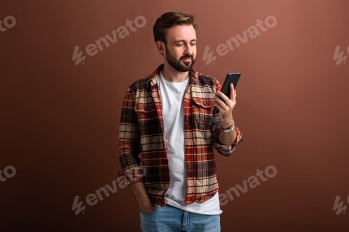 Preview: handsome man on brown background