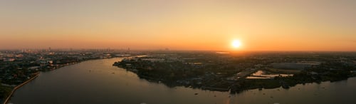 Preview: Serene beauty of Thailand at sunset over the tranquil Chaopraya River