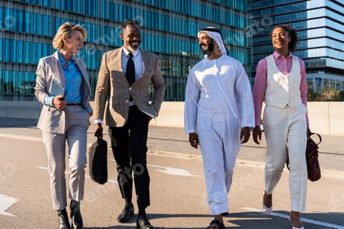 Preview: Group of multiethnic business people meeting an emirati businessman