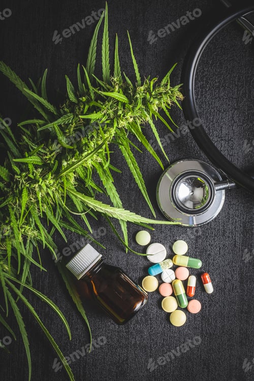 Preview: Marijuana buds flowers of cannabis, stethoscope,pills and oil.