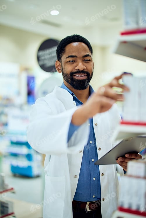 Preview: Pharmacist Organizing Medicine Shelves While Holding a Clipboard in a Modern Pharmacy