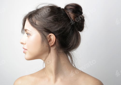 Preview: Woman Profile with Brown Hair in a Bun