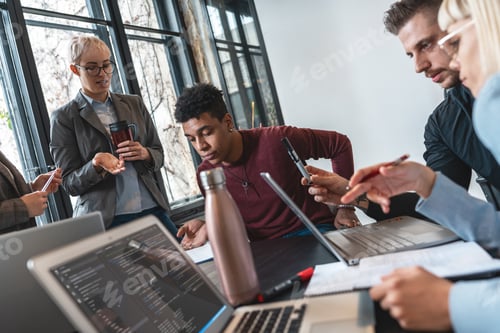 Preview: Casual marketing executives meeting.