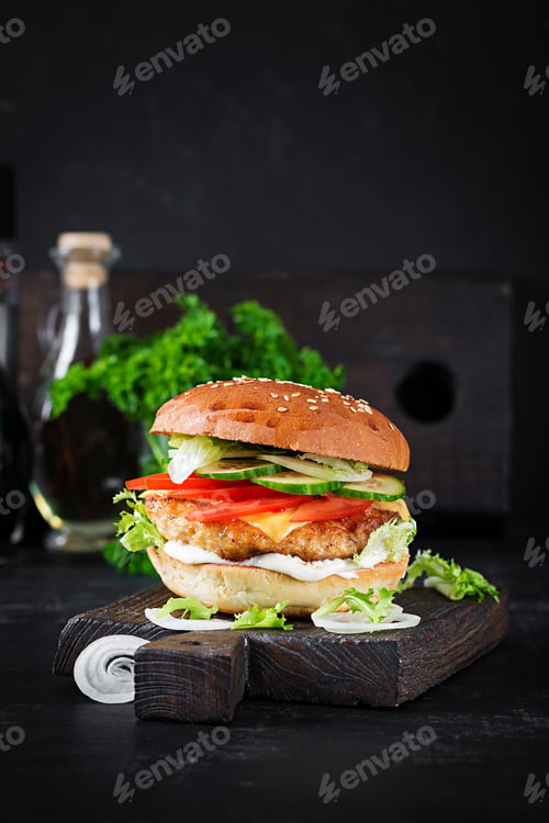Preview: Hamburger with chicken burger meat, cheese, tomato, cucumber and lettuce
