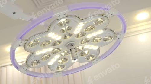 Preview: The surgical lamp shines bright. Action. View from the operating table, operating room details at a