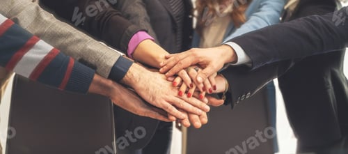 Preview: Business Team Hands Together in Unity - Teamwork and Collaboration Concept
