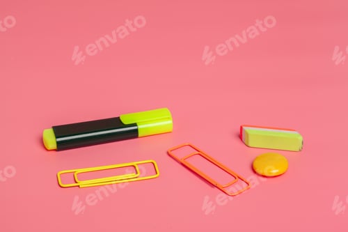 Preview: Bright stationary items on a pink background showcasing creativity and organization