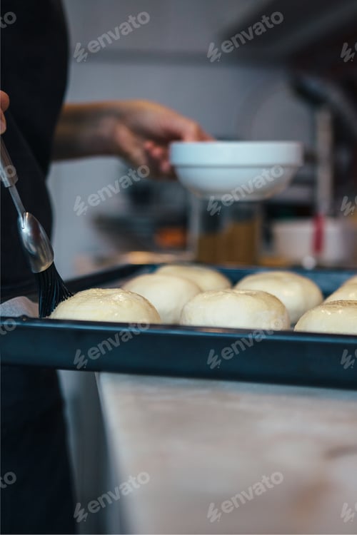 Preview: Baker buttering buns