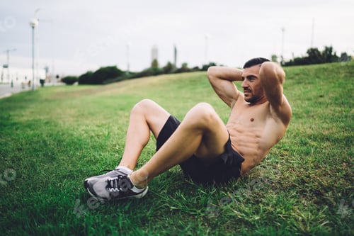 Preview: strength shirtless male athlete keeping vitality and wellness on intensive activity