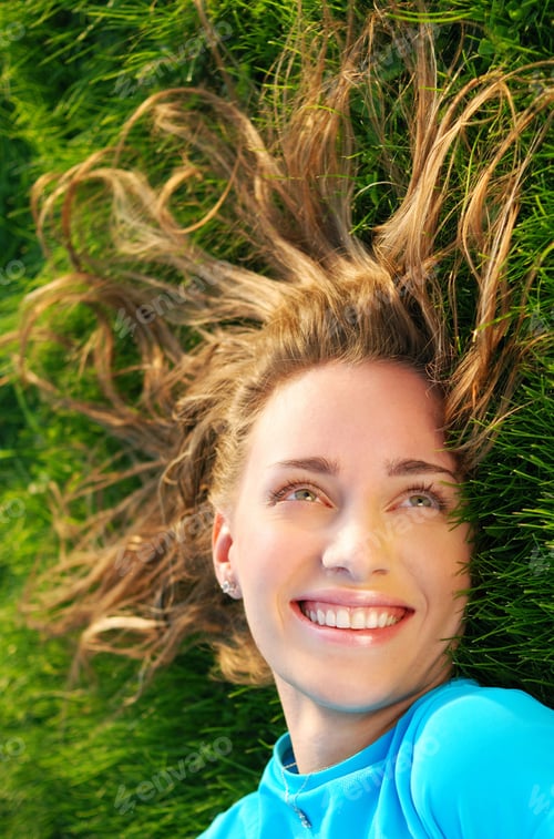 Preview: Girl Laying On Fresh Green Grass