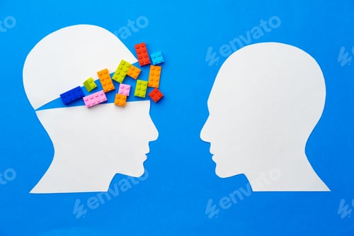 Preview: Papercut silhouette of human head with colorful constructor pieces