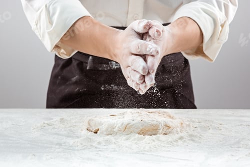 Preview: Hands kneading a dough