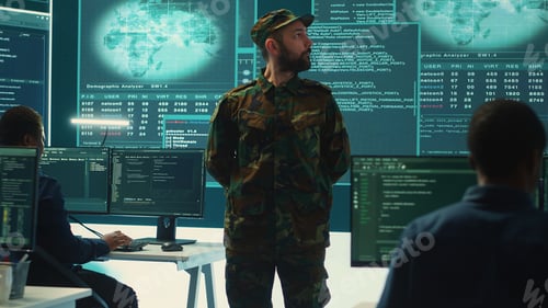 Preview: Military personnel working in a government cyber defense center