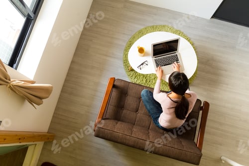 Preview: Top view of woman use of the laptop computer