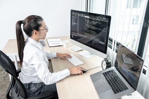 Preview: Women programmers working on website project in software development on the desktop computer