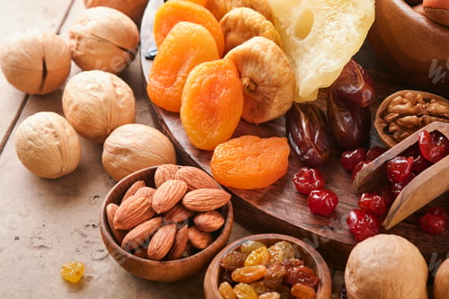 Preview: Tu Bishvat celebration concept. Mix of dry fruits and nuts almonds, hazelnuts, walnuts, apricots, pr