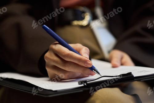 Preview: Middle Aged Caucasian Woman Writing Notes during School Principal Meeting