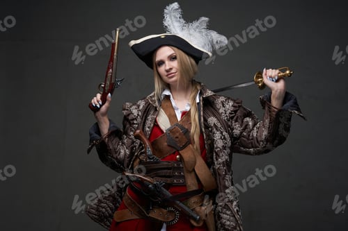 Preview: Woman buccaneer dressed in pirate suit and hat