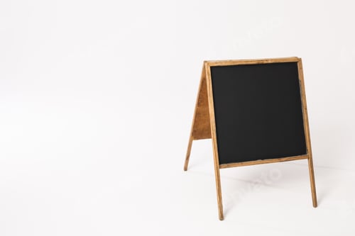 Preview: Black sign in wooden frame and copy space on white background