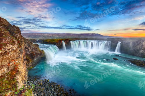 Preview: Fantastic sunset scene of powerful Godafoss waterfall.