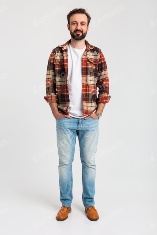 Preview: handsome bearded man in hipster outfit dressed in jeans and checkered shirt