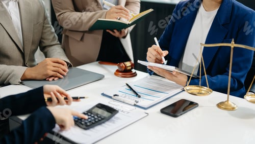 Preview: business people and lawyers discussing contract papers sitting at the table. Concepts