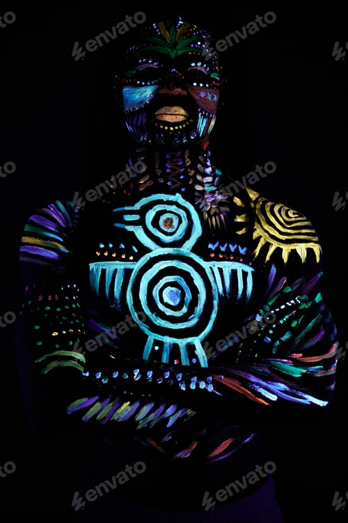 Preview: fashionable male model with fluorescent UV body art