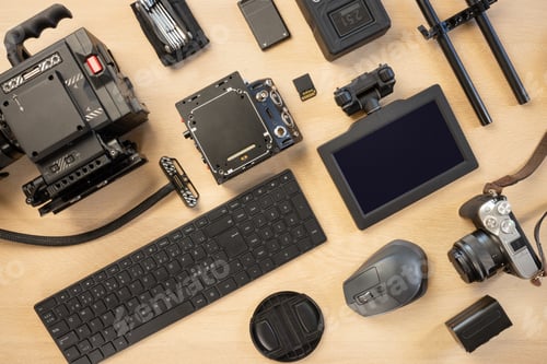 Preview: Directly above shot of computer parts and photographic equipment on table
