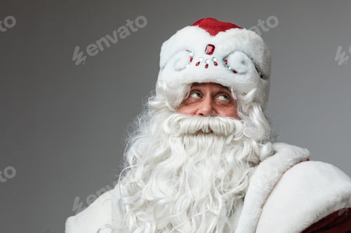 Preview: Pensive Father Frost in hat with white beard.