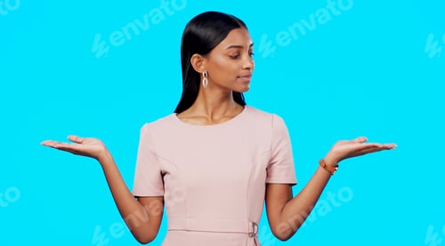 Preview: Choice, option or decision and a woman on a blue background in studio with a hand gesture. Portrait
