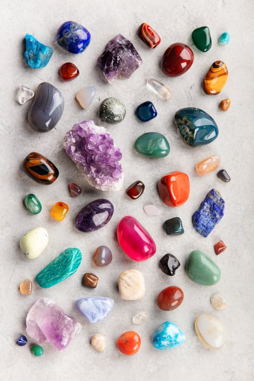 Preview: Assorted Healing Crystals and Gemstones on Stone Surface