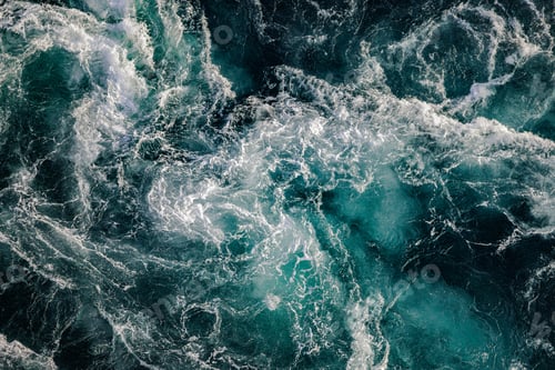 Preview: Blue waves of water of the river and the sea meet each other during high tide and low tide.
