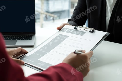 Preview: Business people hold a resume and talk to job applicants for job interviews about careers and Their