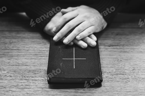 Preview: Hands over the holy bible
