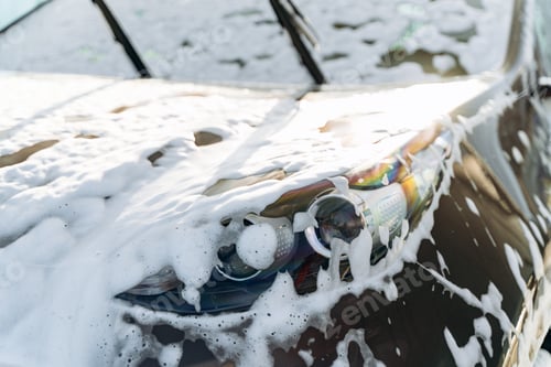 Preview: Outdoor car wash with foam soap.