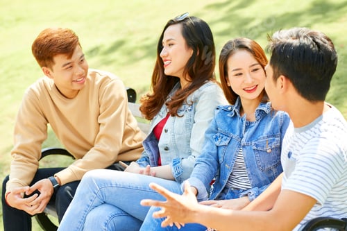 Preview: University Students Sitting on Campus