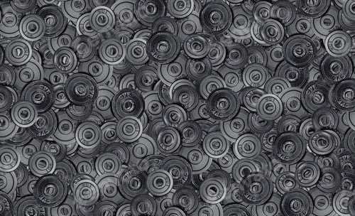 Preview: Pattern made from a stack metal weights 1kg and 2kg. Top view, flat lay.